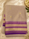 Beige semi silk kanjeevaram with magenta gold border